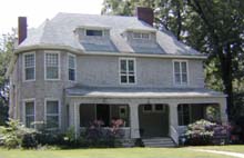 Shingle style house on West Cabanne Place