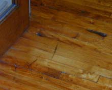 Shiny wood floor and wood molding